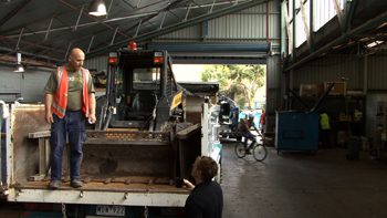 Bobcat & truck on location